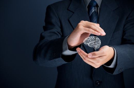 man protecting image of a brain in his hands